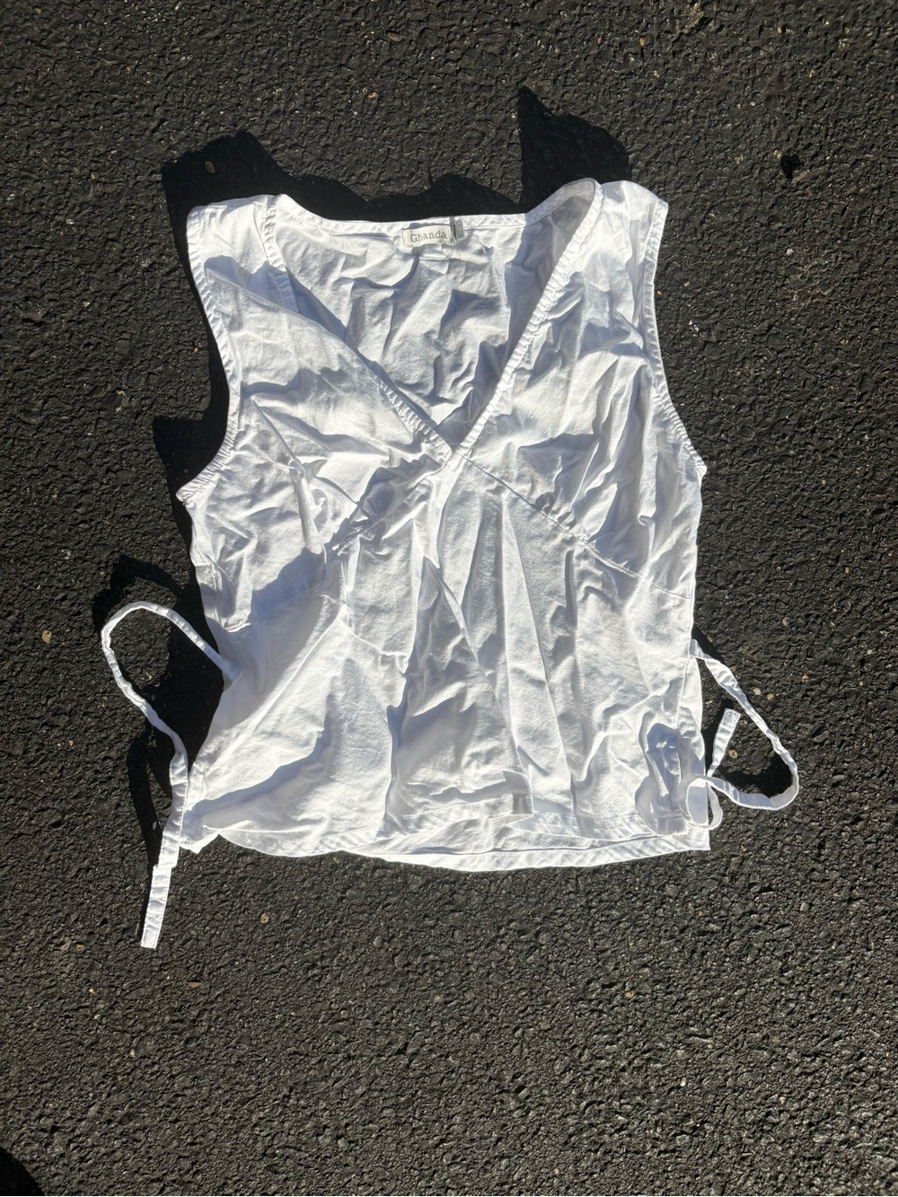Ghanda White Sleeveless V-Neck Tie-Side Blouse